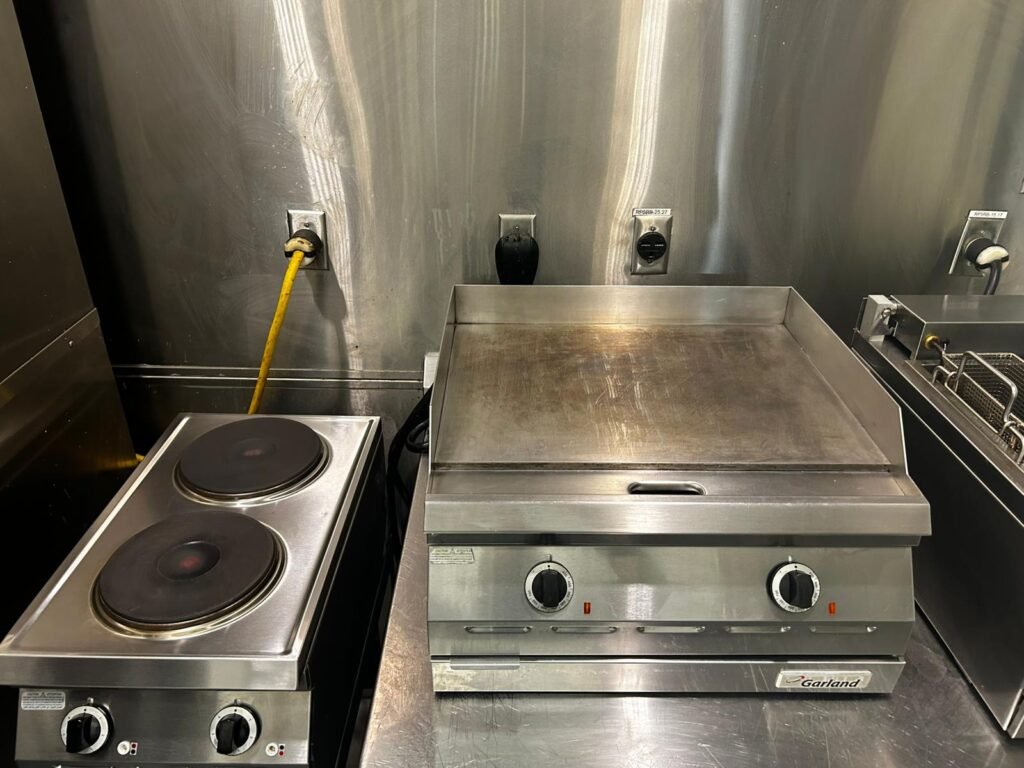 Commercial kitchen griddle after deep cleaning by DR Appliance