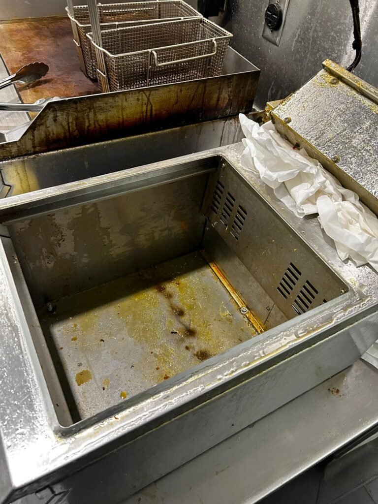 Commercial deep fryer before deep cleaning